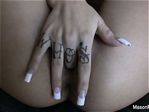 tattooed up Mason Moore fingers her labia on the sofa